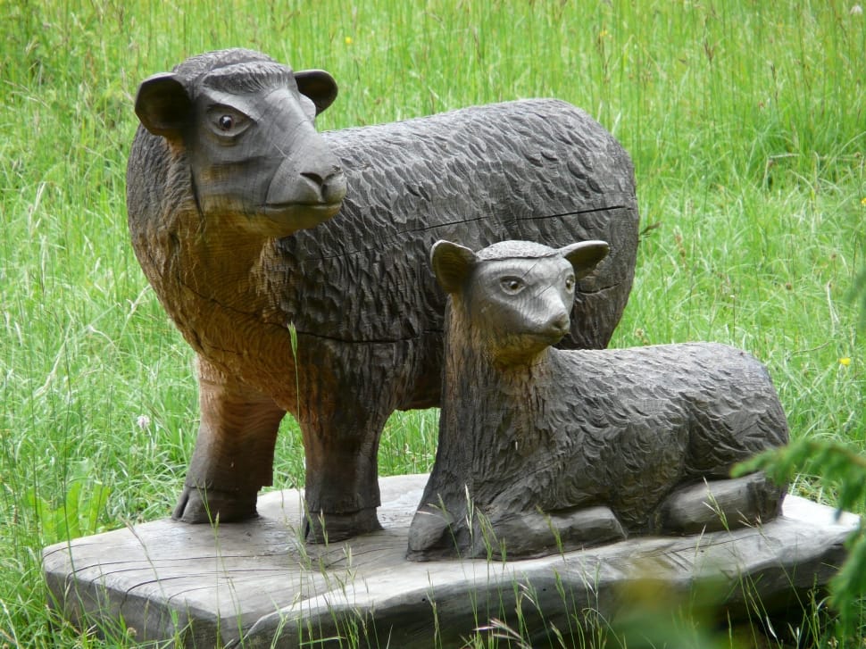 gray and brown animal wooden sculpture preview