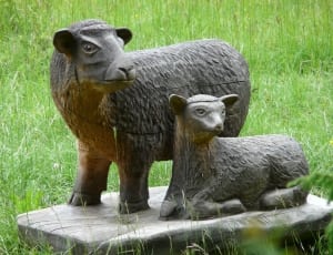 gray and brown animal wooden sculpture thumbnail