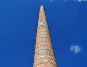 low angle photography of brown brick pillar building thumbnail