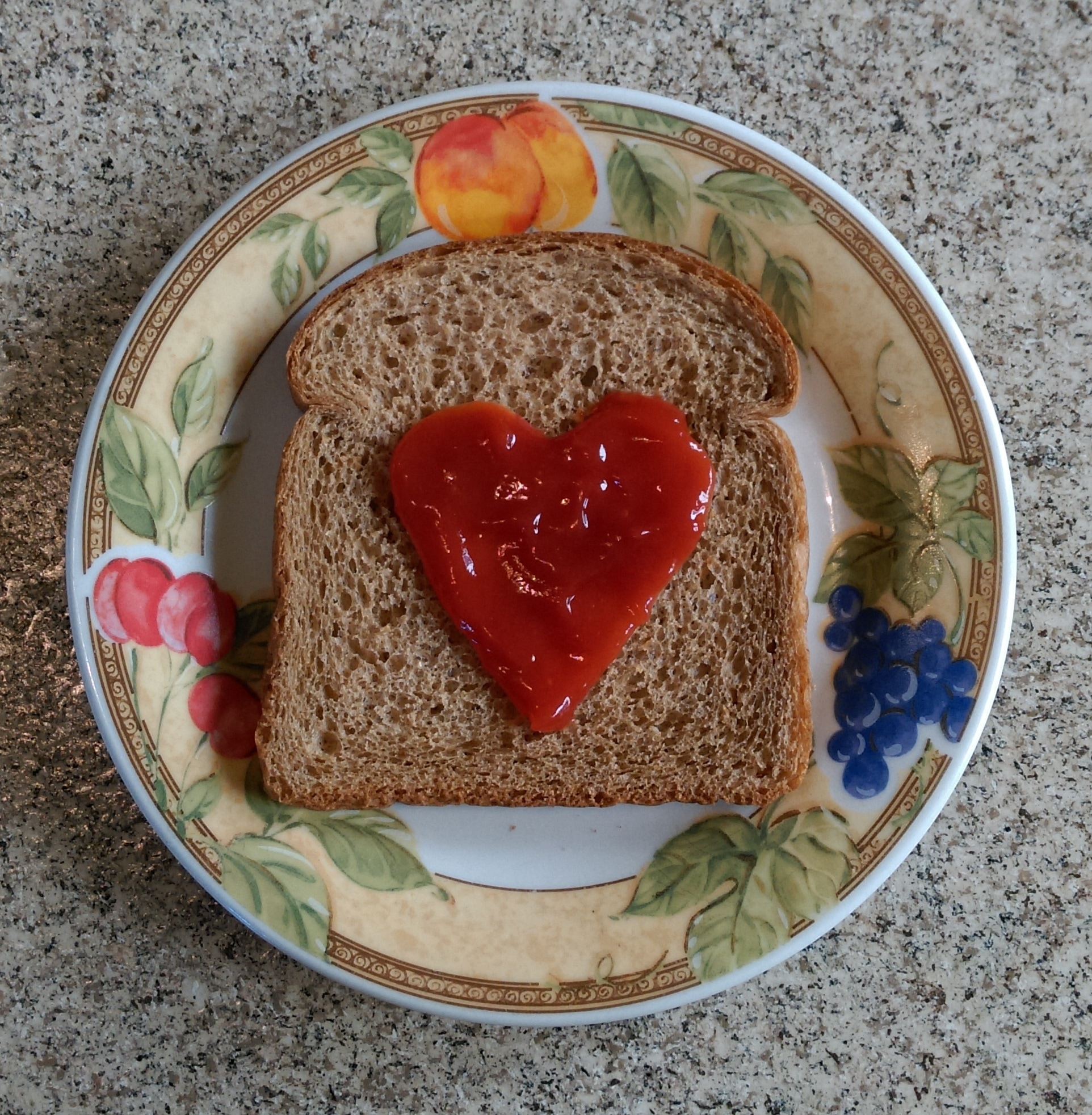 sliced bread with heart ketchup