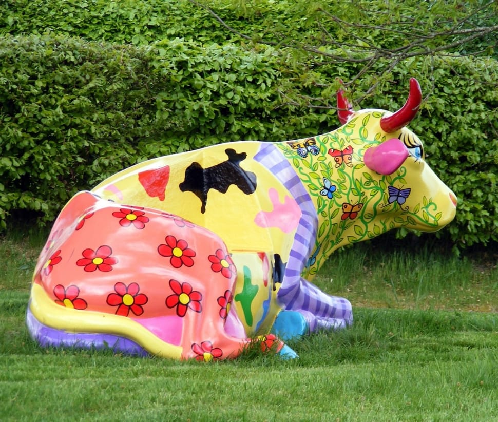 yellow green purple and red floral sitting cow stature preview
