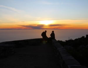 silhouette of 2 person during golden hour thumbnail
