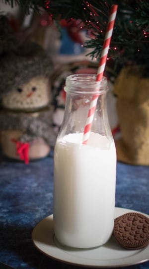 clear milk bottle with straw and cookie thumbnail
