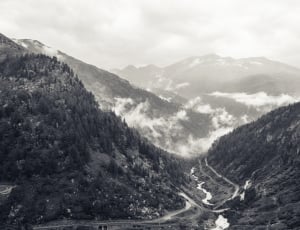 grayscale photo of mountain during daytime thumbnail