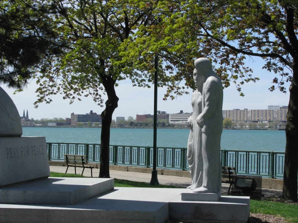 2 statues near body of water at daytime preview
