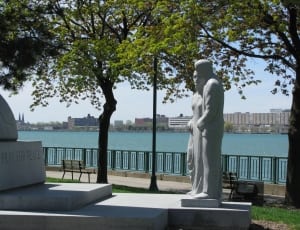 2 statues near body of water at daytime thumbnail