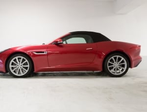 red sports coupe thumbnail