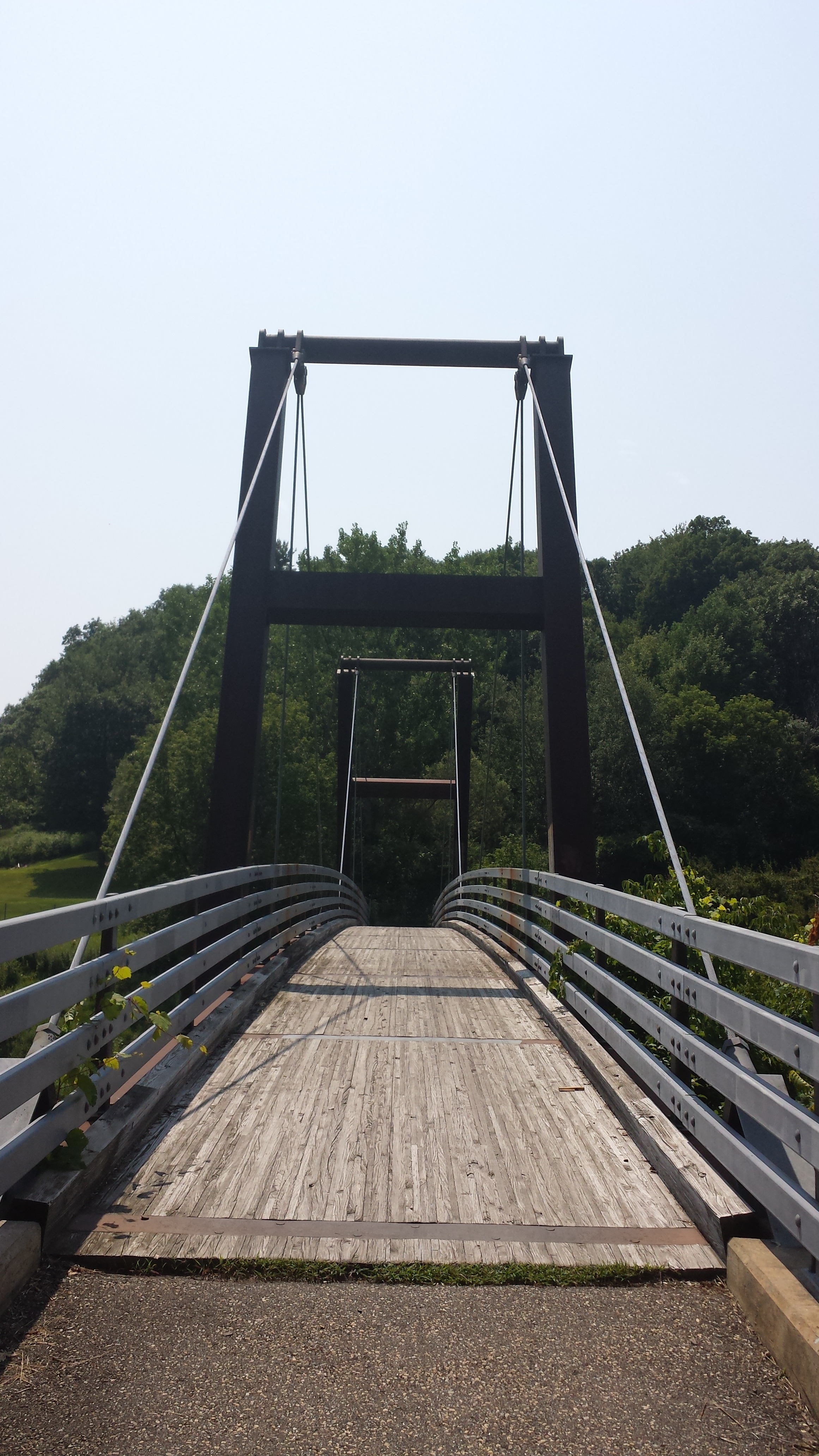brown and gray suspension bridge