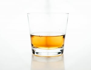 clear drinking glass with brown contetn thumbnail