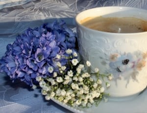 white blue and brown floral ceramic cup thumbnail