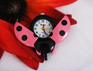 black and pink lady bug themed analog table clock thumbnail