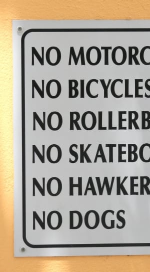 no motorcycles no bicycles no rollerblades no skateboards sign thumbnail