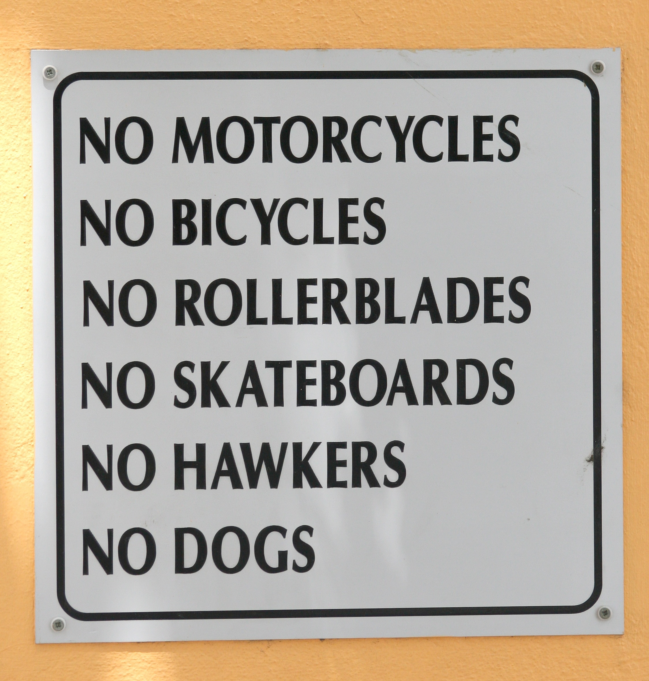 no motorcycles no bicycles no rollerblades no skateboards sign