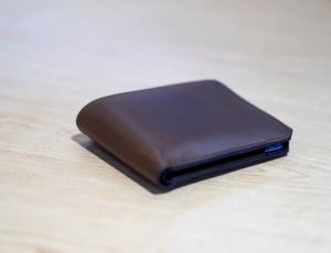 brown leather bi-fold wallet thumbnail