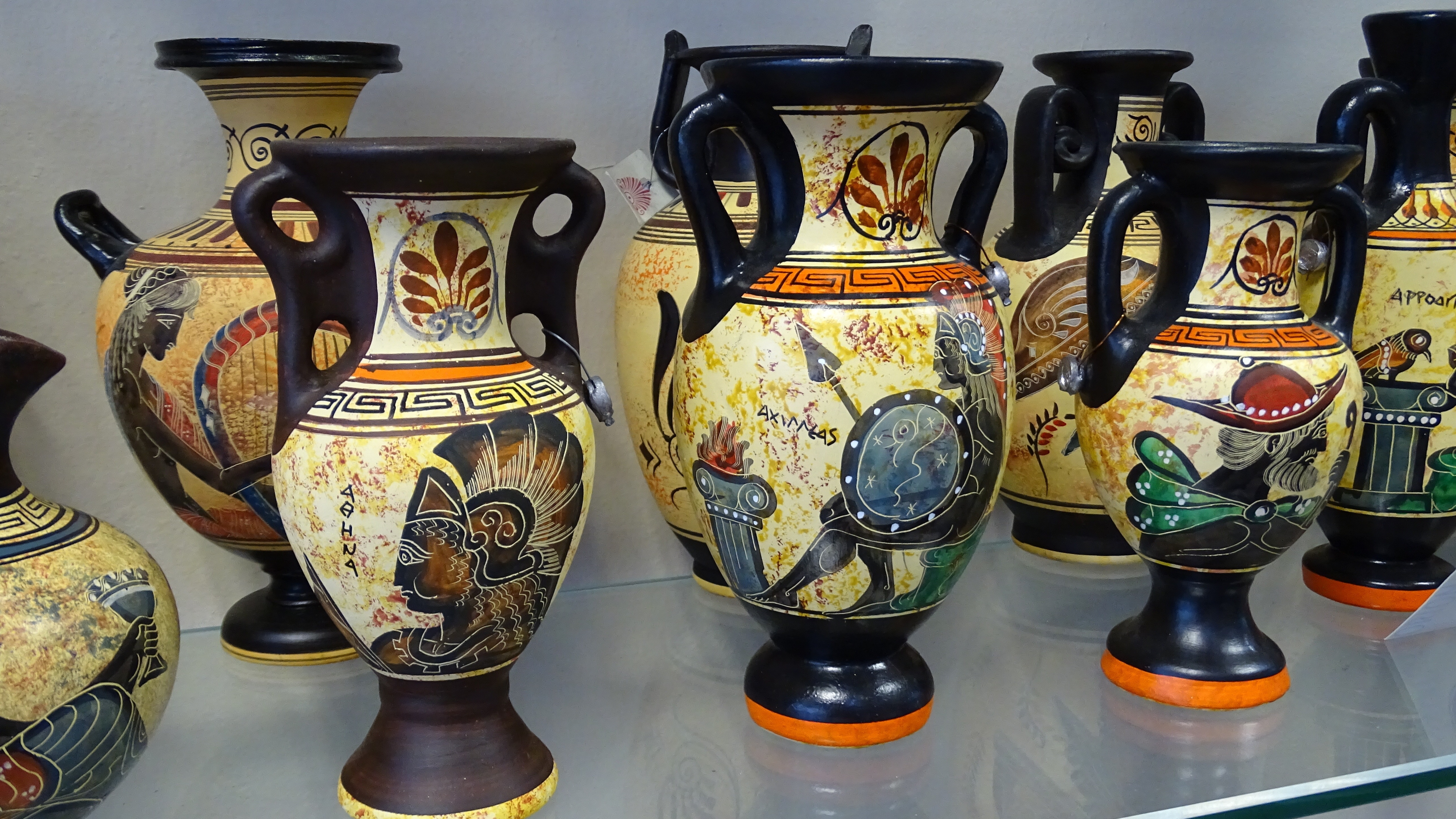 beige and black ceramic vase collection