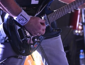 black double cutaway electric guitar thumbnail