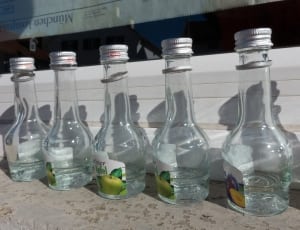 5 clear glass bottles thumbnail