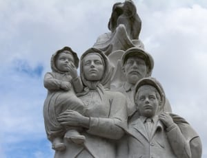 white concrete family statue thumbnail