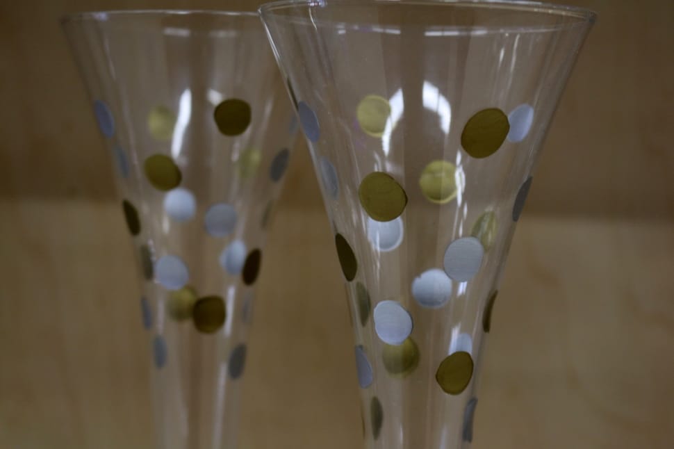 2 green and blue polka dotted glasses preview