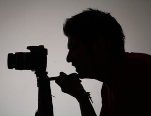 silhouette of man taking photo thumbnail
