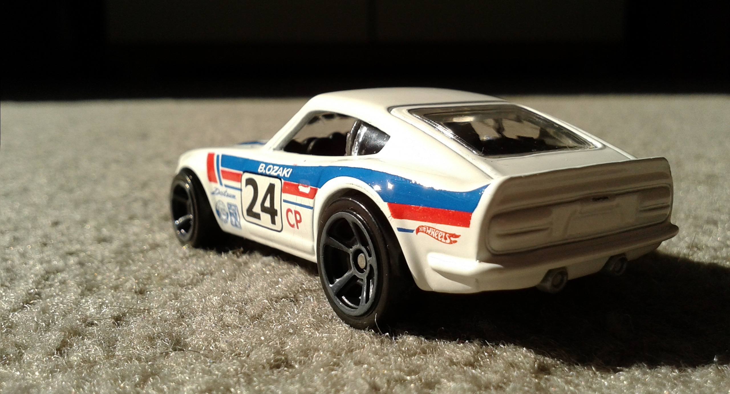 white and blue classic car diecast