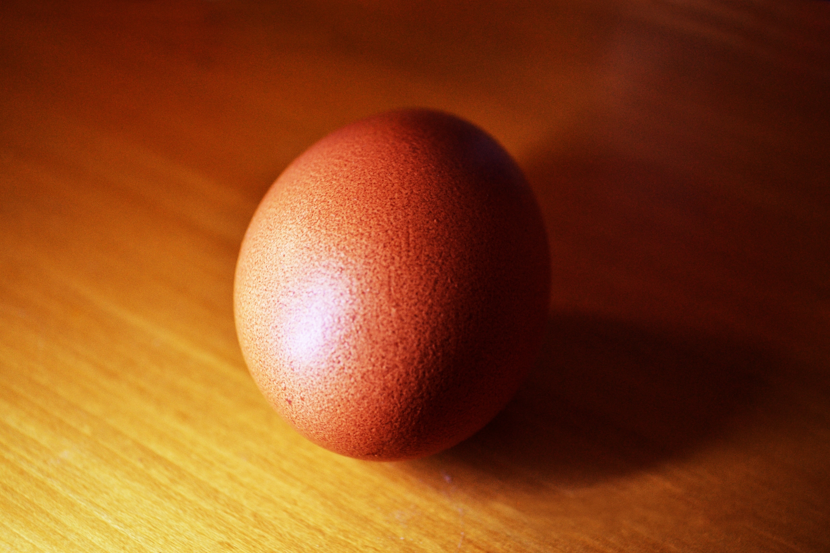 egg on top of brown surface