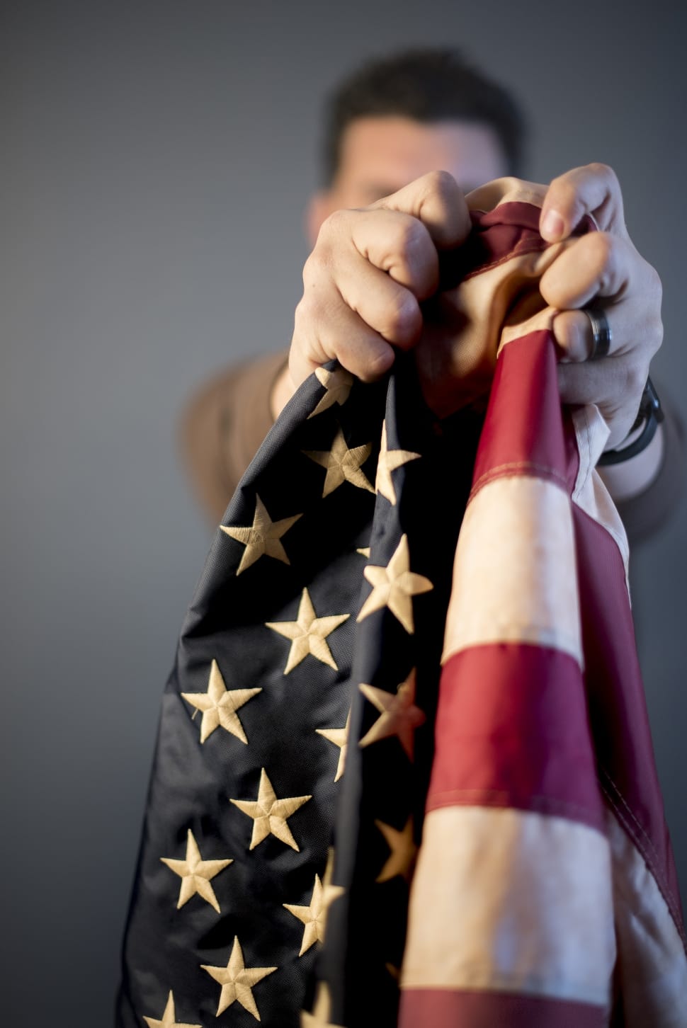 person holding a usa flag preview