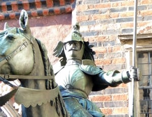 armored man riding a horse statue thumbnail