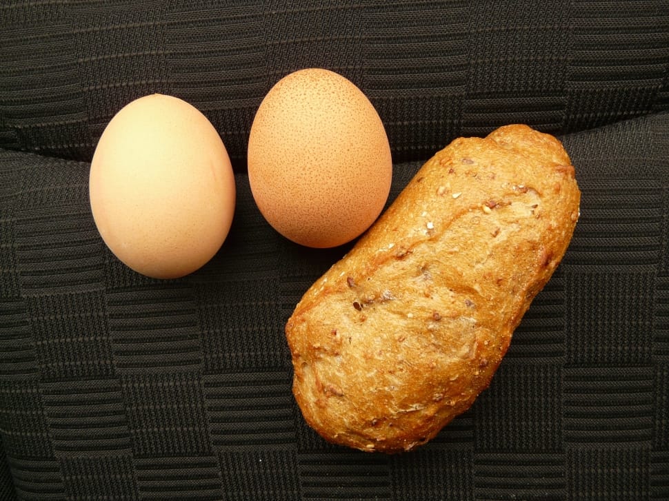 2 brown eggs and bread preview