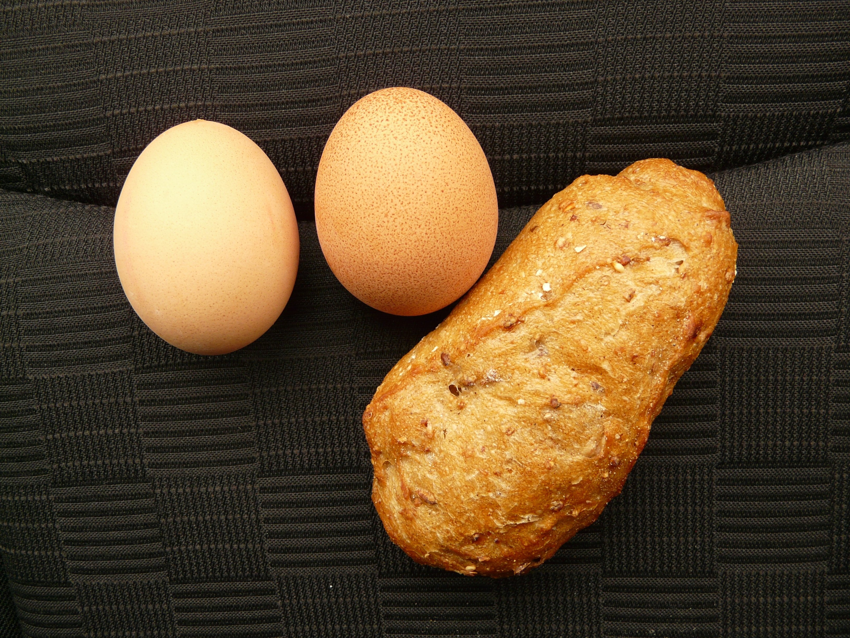 2 brown eggs and bread