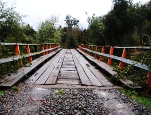 brown and red wooden bridge thumbnail