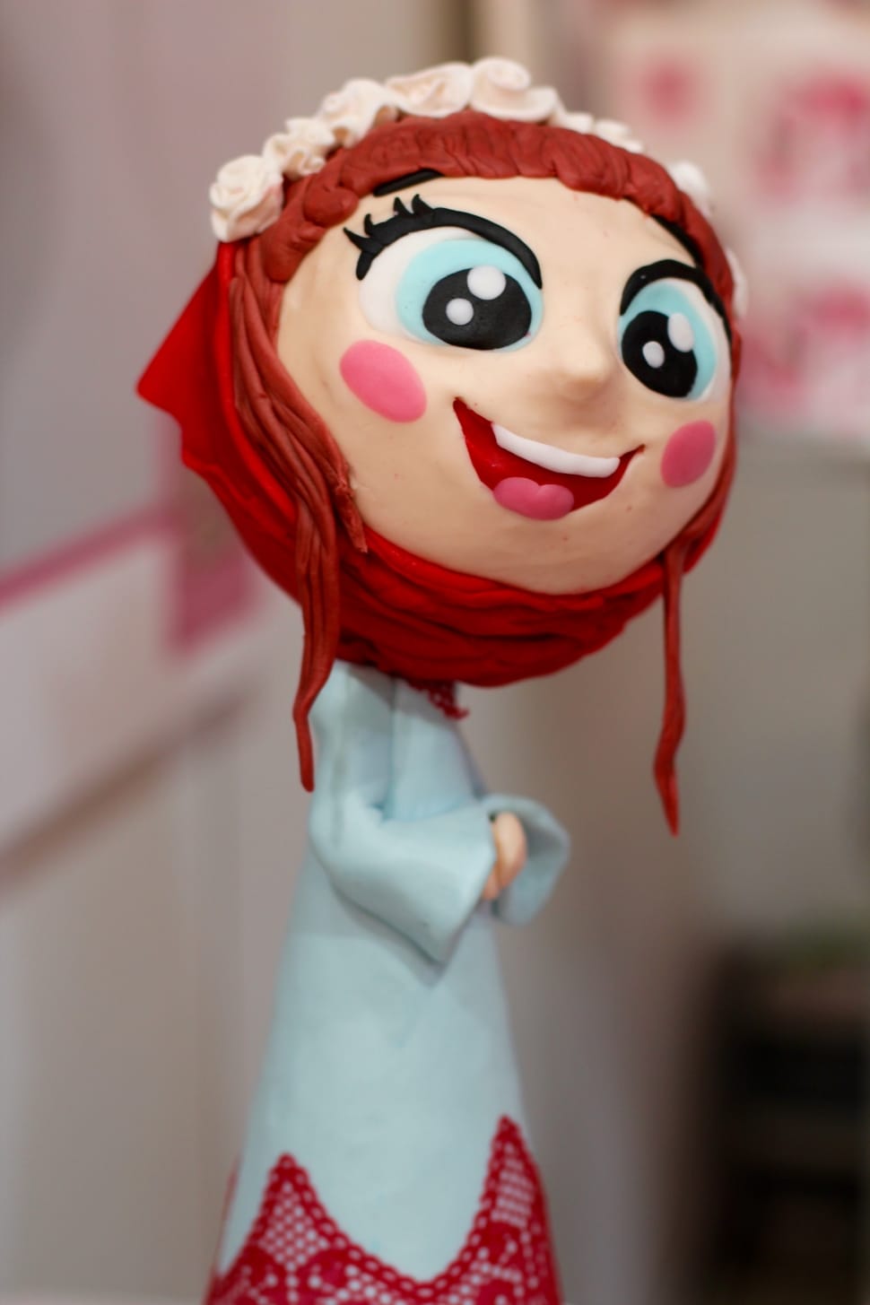 red haired female character toy preview