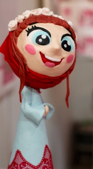 red haired female character toy thumbnail
