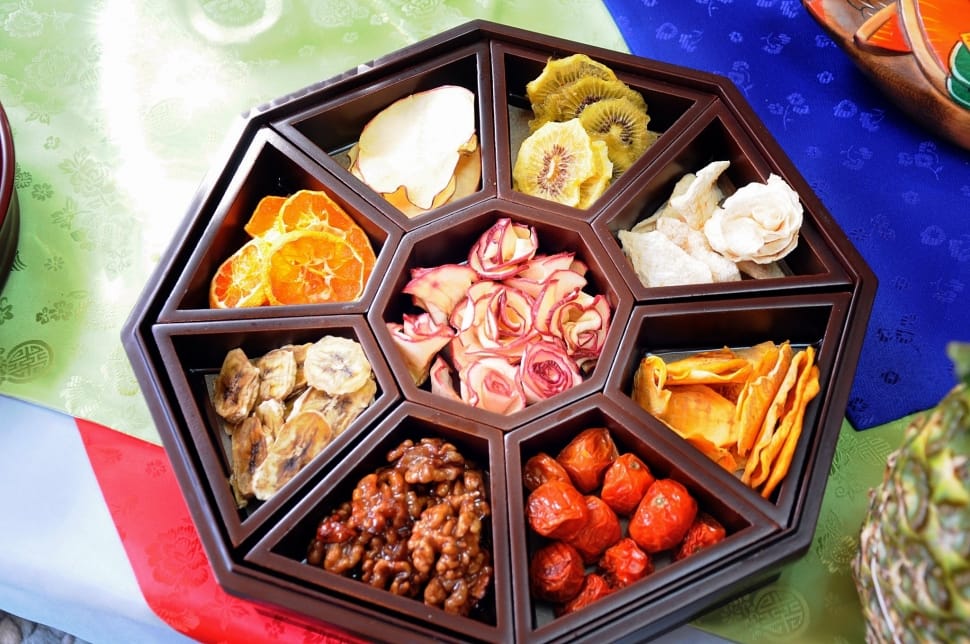 brown wooden tray with assorted food preview