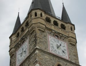 gray and brown clock tower thumbnail