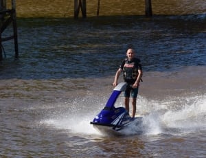 white and blue personal watercraft thumbnail
