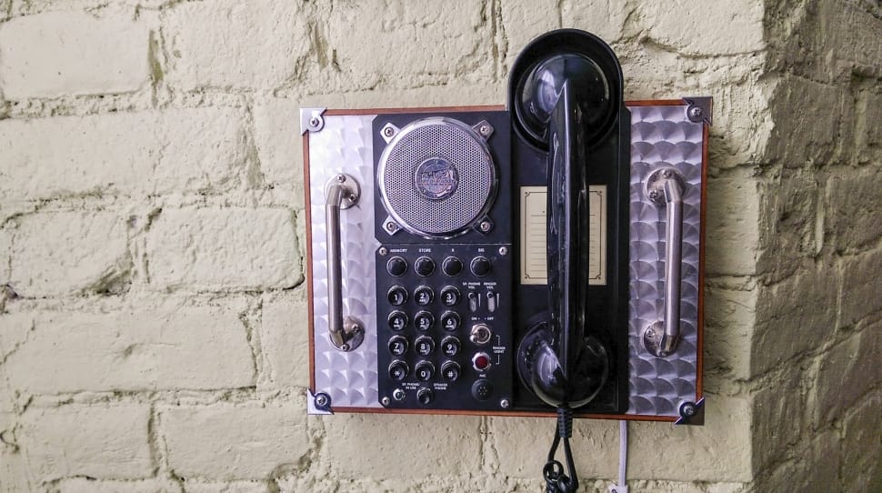 black and silver wall mount telephone preview