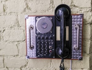 black and silver wall mount telephone thumbnail