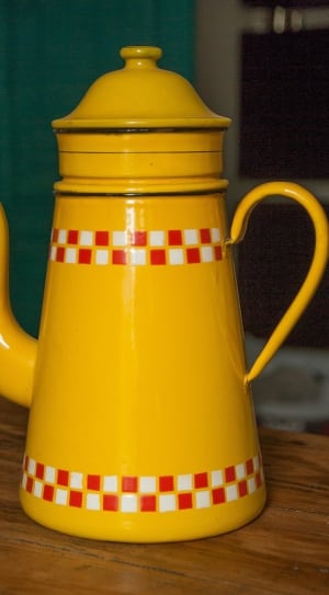 yellow white and red ceramic teapot thumbnail