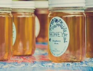 honey raspberry jars on floral textile thumbnail