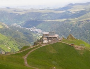 aerial view of brown house on mountain peek thumbnail