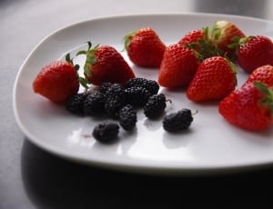 red strawberries and black raspberries thumbnail