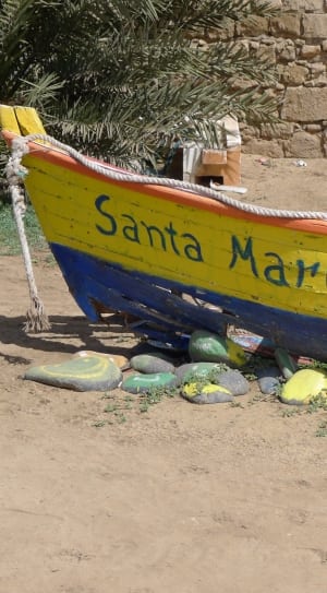 yellow orange and blue santa maria boat thumbnail