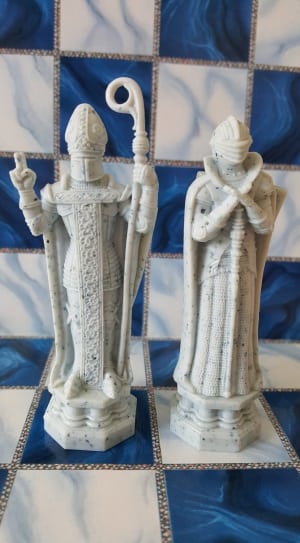 2 white and blue ceramic priest figurine thumbnail