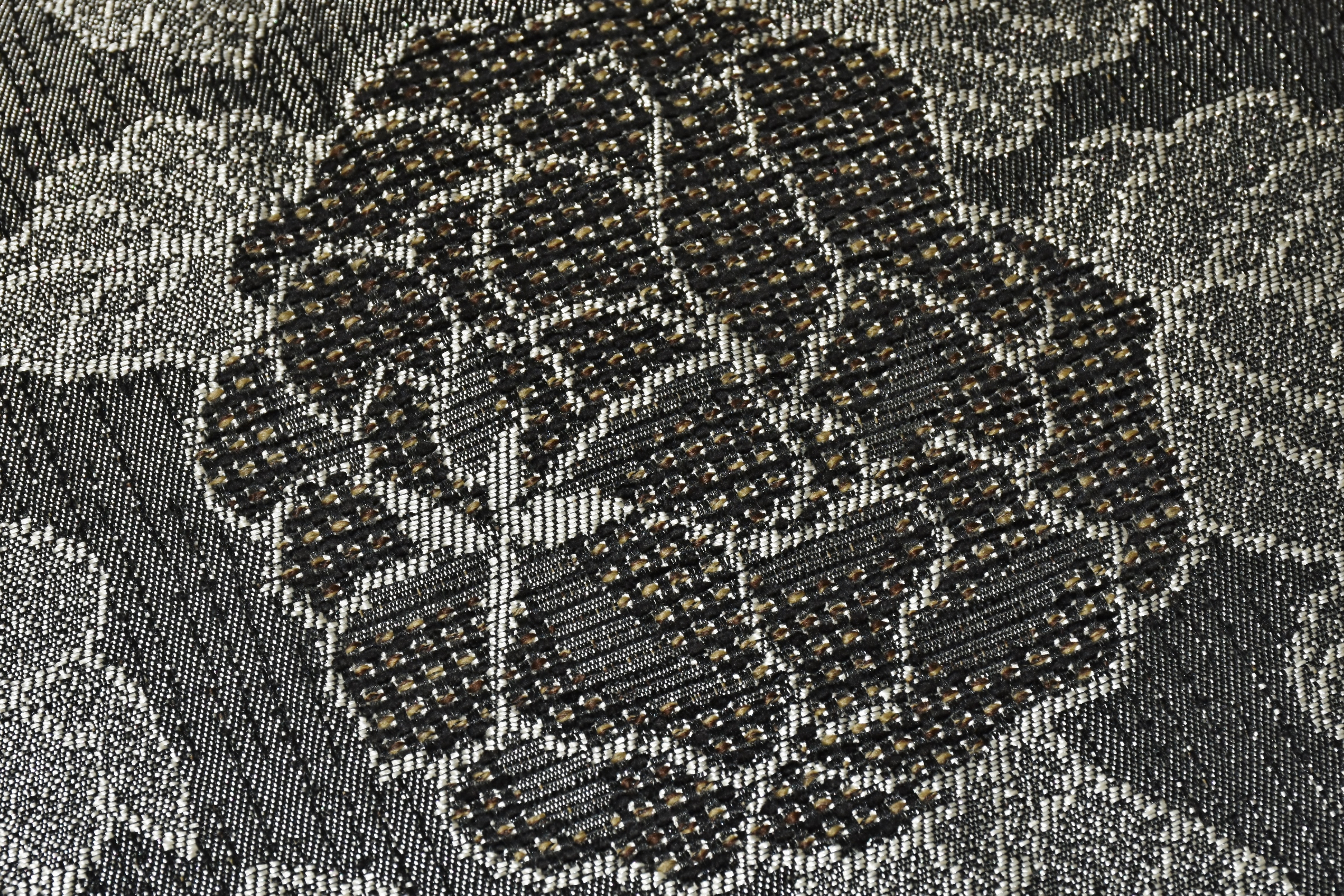 black and gray floral textile