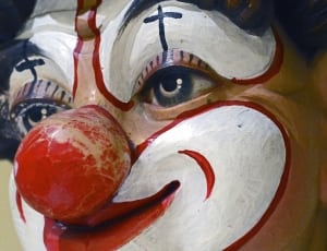 white red and blue clown face thumbnail