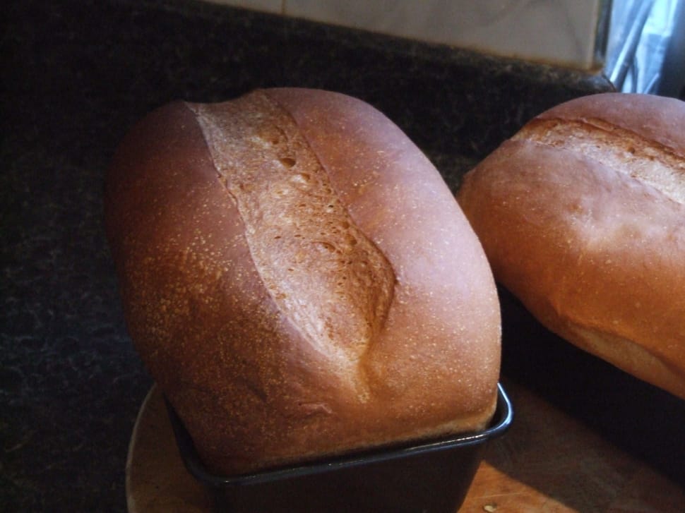 2 breads and black plastic container preview