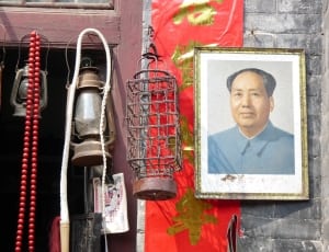 2 metal lantern and paintin of man wearing blue collar top thumbnail