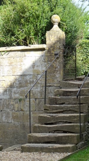 black steel brace and stone steps stair case thumbnail