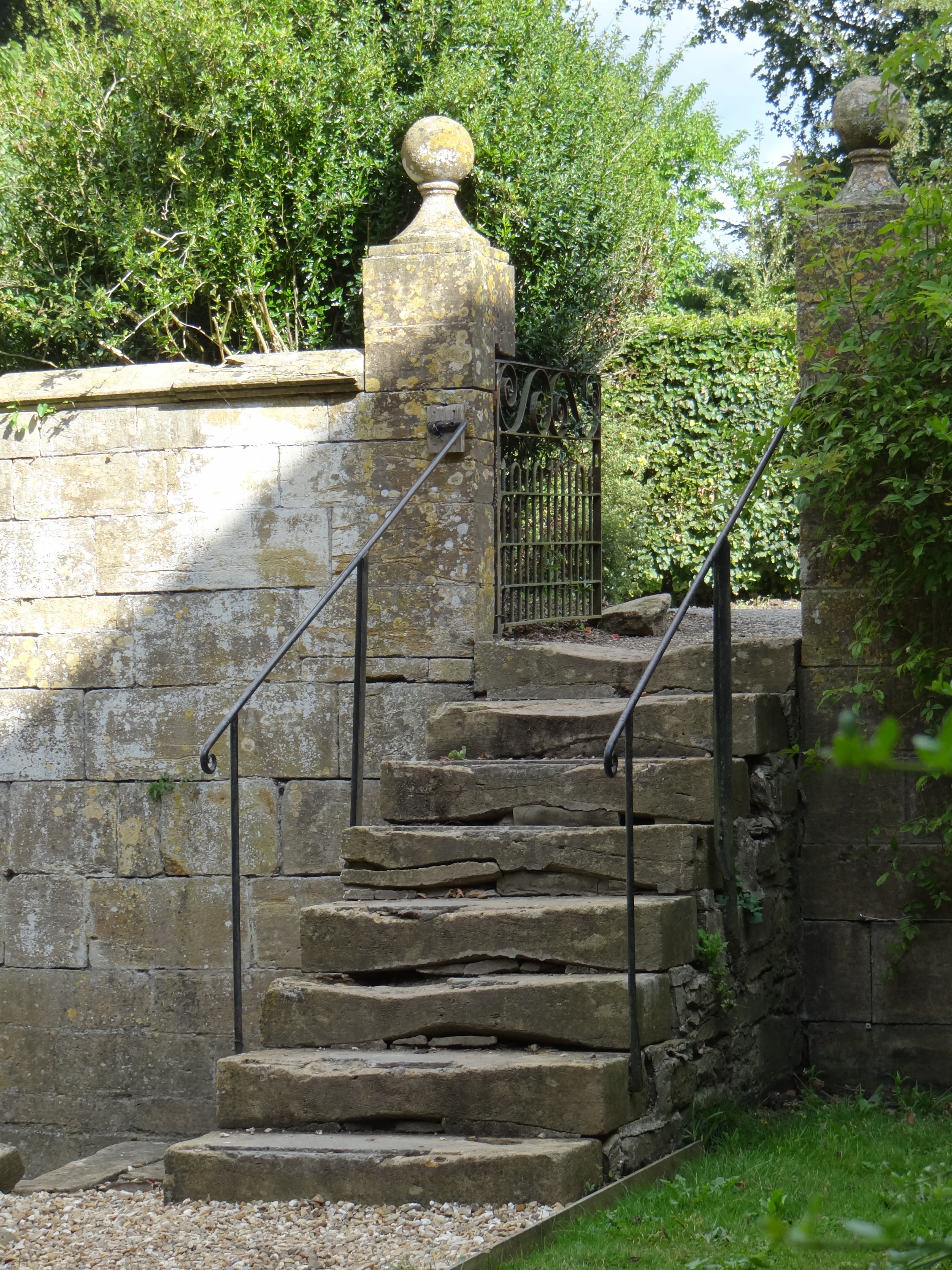 black steel brace and stone steps stair case